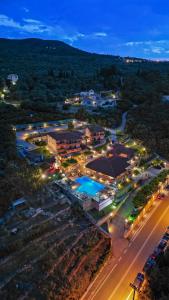 an aerial view of a resort at night at Semiramis in Lefkada Town