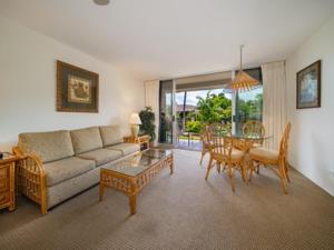 a living room with a couch and a table at Kaanapali Maui at the Eldorado by OUTRIGGER in Lahaina