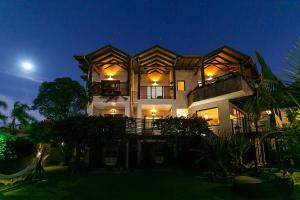 Градина пред Shiva Boutique Hotel - Praia do Rosa