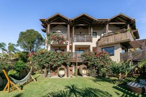 Градина пред Shiva Boutique Hotel - Praia do Rosa