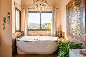 Баня в Shiva Boutique Hotel - Praia do Rosa
