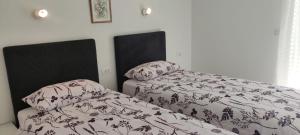 Postelja oz. postelje v sobi nastanitve Apartments INBOX