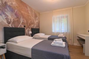 Posteľ alebo postele v izbe v ubytovaní Villa Suzana with Heated Pool and outdoor billiards