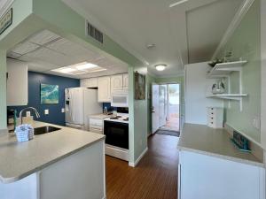 Köök või kööginurk majutusasutuses Sandpiper Cove 1005