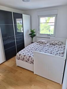 Ένα ή περισσότερα κρεβάτια σε δωμάτιο στο Guesthouse Flower