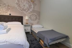 Posteľ alebo postele v izbe v ubytovaní Villa Suzana with Heated Pool and outdoor billiards