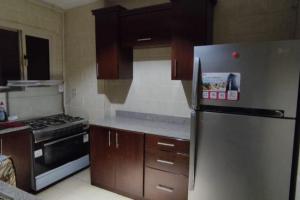 Kuchyň nebo kuchyňský kout v ubytování حدائق الاهرام