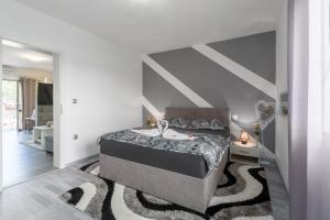 Apartment 50 shades of grey Poreč tesisinde bir odada yatak veya yataklar