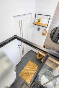 Koupelna v ubytování Sun x Mountains - Black Church