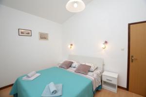 Postel nebo postele na pokoji v ubytování House MARLU