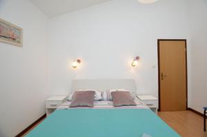 Postel nebo postele na pokoji v ubytování House MARLU