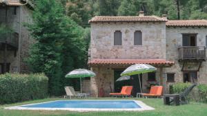 Bazén v ubytování Stone Made Private Pool Villas Kriopigi nebo v jeho okolí