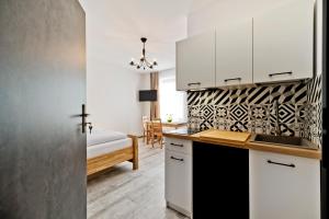 O bucătărie sau chicinetă la Willa Marina