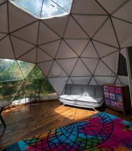 Postel nebo postele na pokoji v ubytování MANDALA CAMP