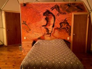 Postel nebo postele na pokoji v ubytování MANDALA CAMP