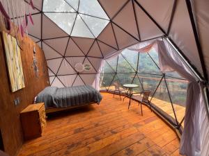 Postel nebo postele na pokoji v ubytování MANDALA CAMP