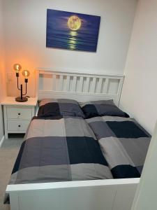 Katil atau katil-katil dalam bilik di Apartmenthaus-Frauenpreis-FeWo-114