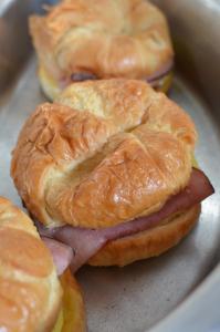 a plate with three pastries with ham and cheese at Residence Inn Pleasanton in Pleasanton
