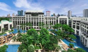 Utsikt över poolen vid Siam Kempinski Hotel Bangkok - SHA Extra Plus Certified eller i närheten