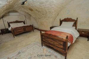 Cama ou camas em um quarto em Kasr-ı Hayat