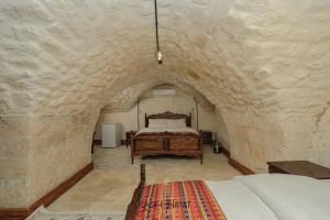 Cama ou camas em um quarto em Kasr-ı Hayat