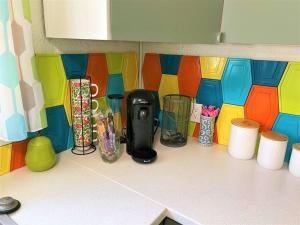 A kitchen or kitchenette at The Flamingo Palms private 1bd 1ba Unit in Duplex