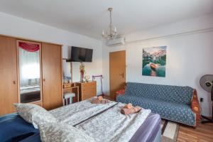 Posteľ alebo postele v izbe v ubytovaní Apartments Ruža Dragove Dugi otok + 37 fotografií