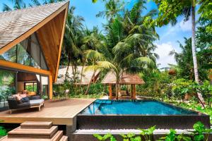 Bazén v ubytování The St. Regis Maldives Vommuli Resort nebo v jeho okolí