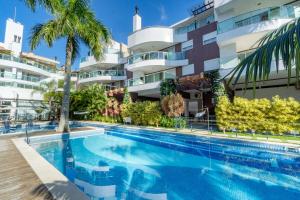 Πισίνα στο ή κοντά στο Apartamento de Luxo em Condo com Piscina e Jacuzzi - Boulevard Bombinhas