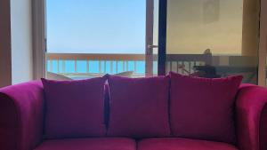 A seating area at Alex sea view apartment - families only
