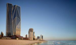 a view of a beach with tall buildings at Jewel Beachfront Residences in Gold Coast