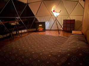 Postel nebo postele na pokoji v ubytování MANDALA CAMP