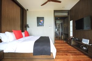 Postel nebo postele na pokoji v ubytování Pavilion Pool Residence Samui - SHA Extra Plus