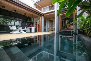 Bazén v ubytování Pavilion Pool Residence Samui - SHA Extra Plus nebo v jeho okolí