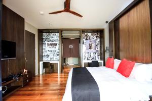 TV a/nebo společenská místnost v ubytování Pavilion Pool Residence Samui - SHA Extra Plus