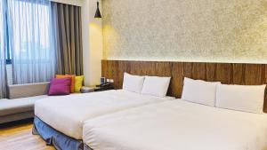 Giường trong phòng chung tại Sunrise Hotel & Resort Taimali +29 ảnh