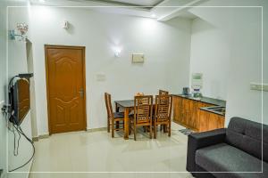 Posezení v ubytování RAIN DROPS PREMIUM VILLAS - Athirappilly