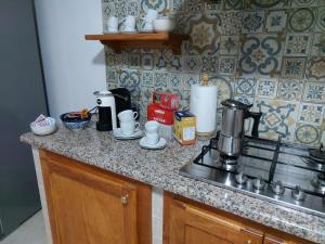 Kuchyň nebo kuchyňský kout v ubytování CASA BELLA VISTA