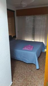 A bed or beds in a room at Florazar 2 Cullera Még 13 kép
