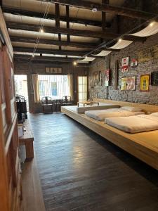 Postel nebo postele na pokoji v ubytování 和寂百年天井老房子包棟民宿wabisabi Japanese Entire Home