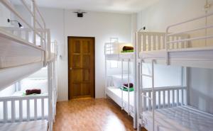 Postel nebo postele na pokoji v ubytování Krabi Pitta House