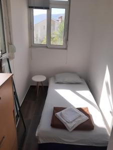 Postel nebo postele na pokoji v ubytování Apartment Happy