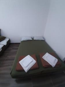 Postel nebo postele na pokoji v ubytování Apartment Happy