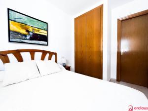 Postel nebo postele na pokoji v ubytování Acogedor SierraMar 1era Línea