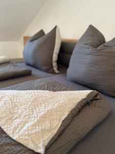 two beds with pillows on the floor in a room at Ferienwohnung Via Callidus in Xanten