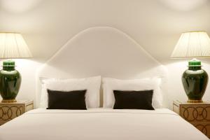 Posteľ alebo postele v izbe v ubytovaní Old Town Luxury Suites Acropolis