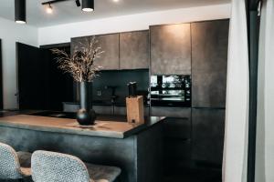 Kjøkken eller kjøkkenkrok på ONKL XONNA Premium Alpin Chalets