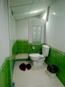 Kúpeľňa v ubytovaní บ้านนารีสอร์ท