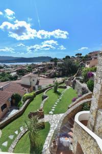 a view of a garden from a building at La Costa View in Arzachena