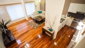 an overhead view of a kitchen and a living room at Yuki Yama Apartments in Kutchan